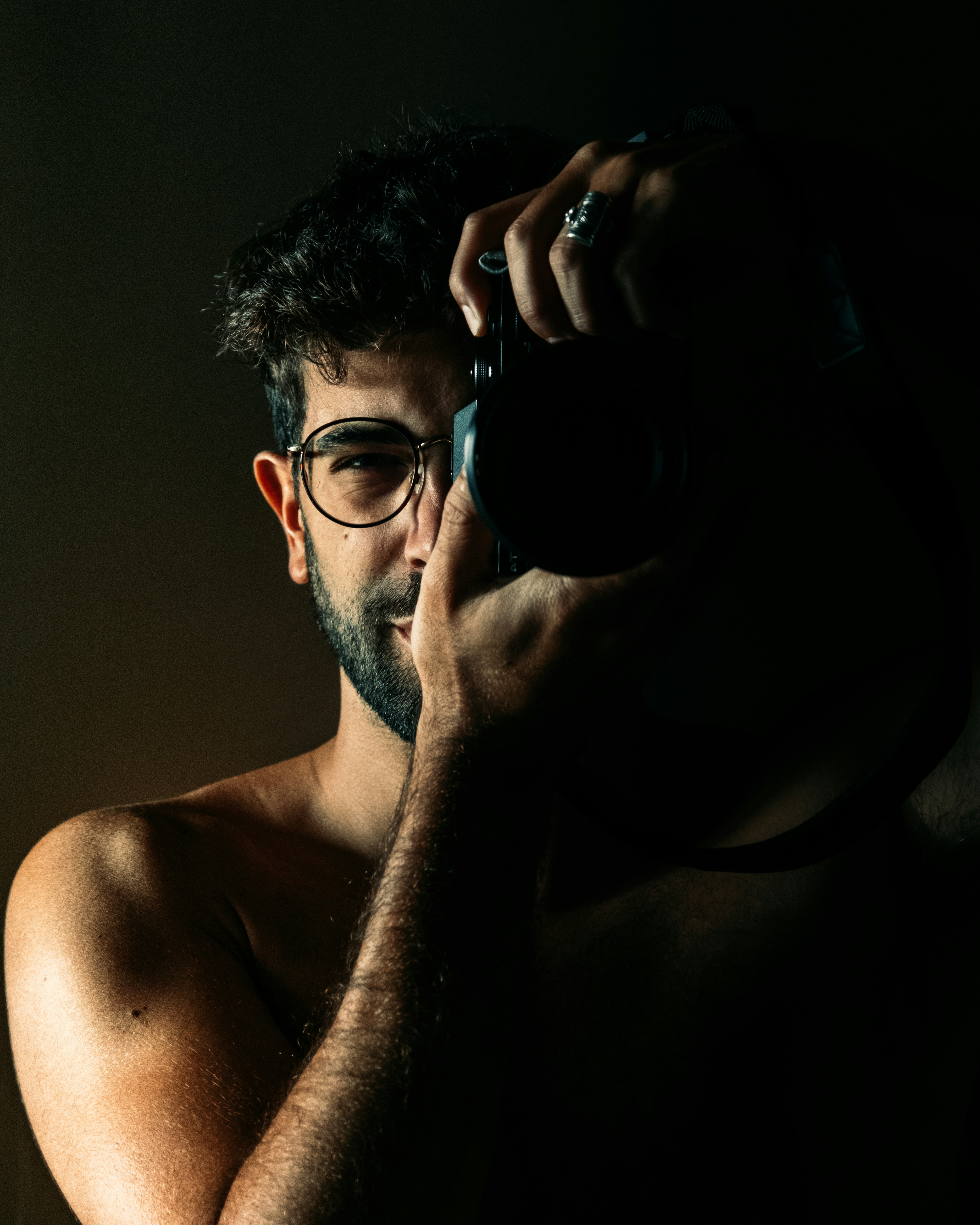 man wearing black framed eyeglasses